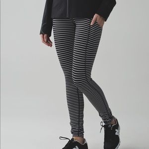 Black and white striped Lululemon speed tights
